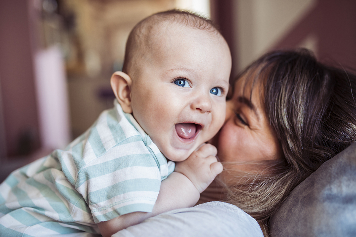 Mom and baby boy having fun